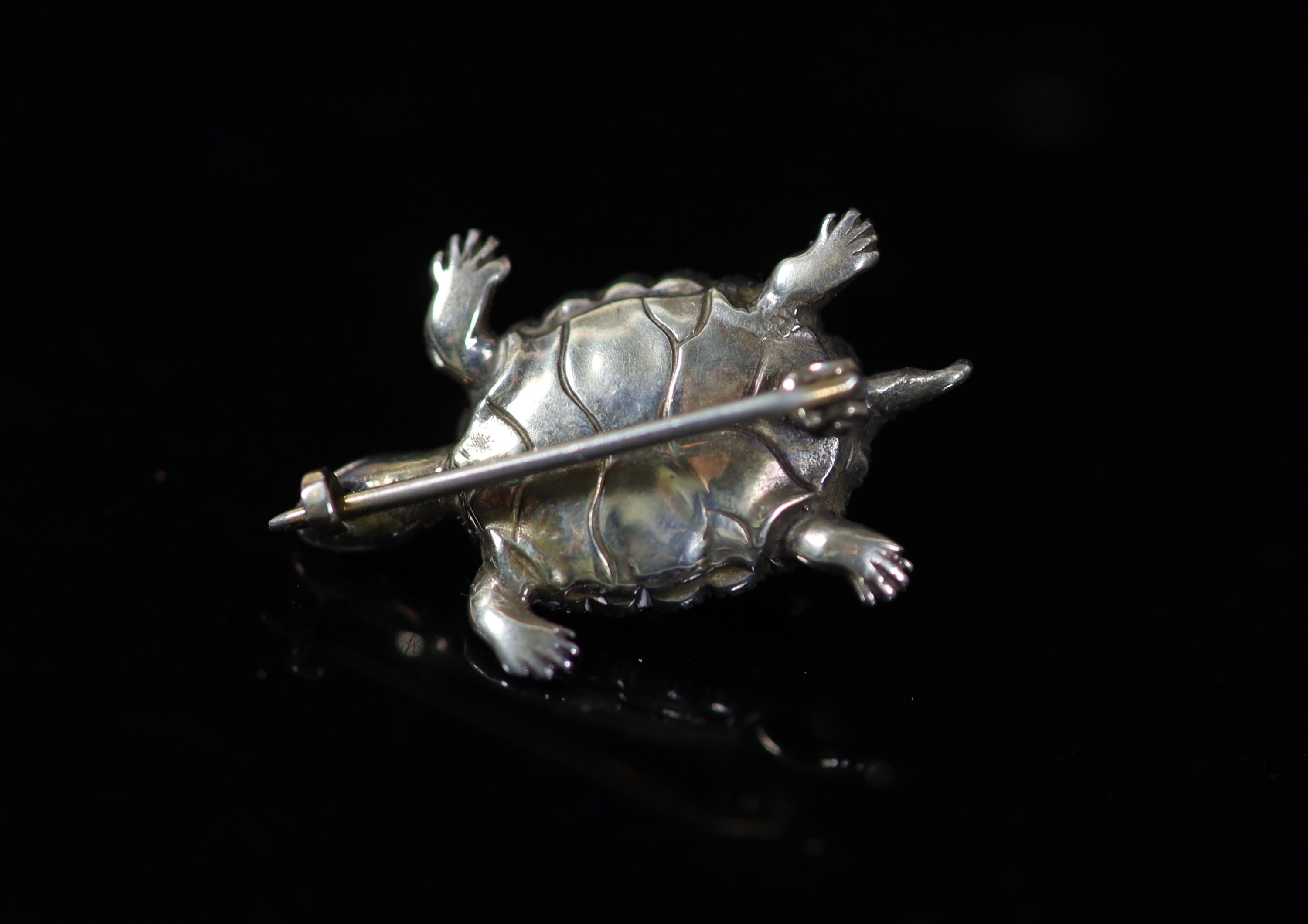 An Edwardian gold and silver, cabochon garnet and diamond set brooch, modelled as a tortoise